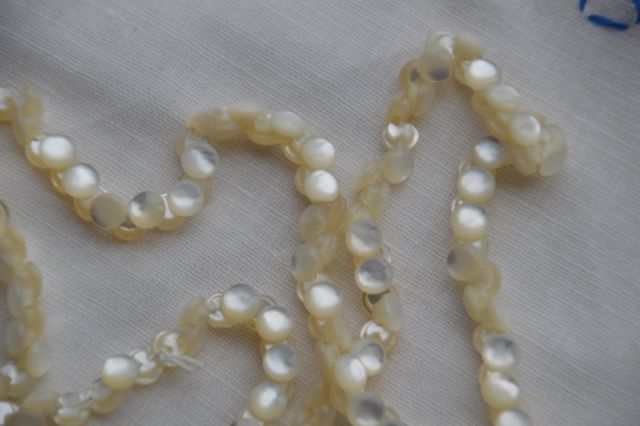 Mother of Pearl Shank Buttons on a String- Size 9